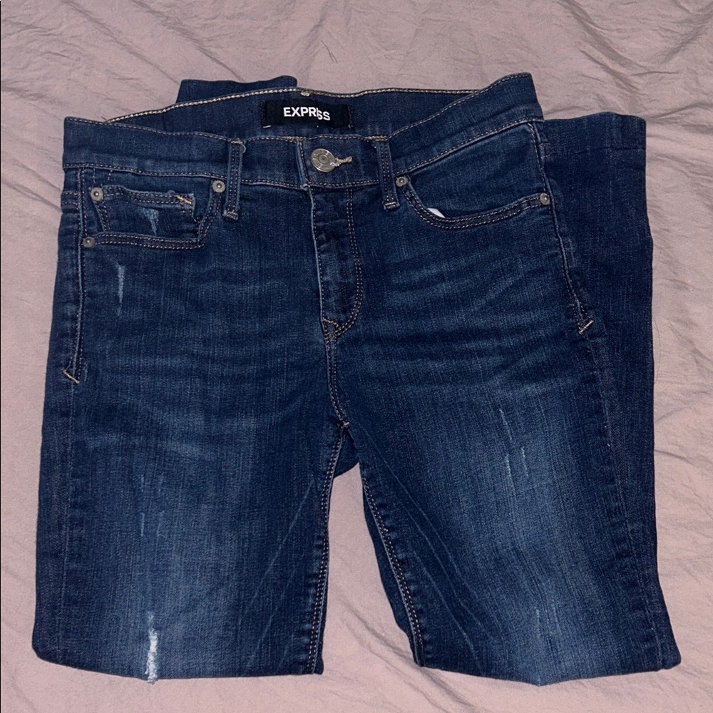 Express Stretch Super Skinny Mid Rise Denim Jeans